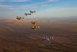 SGR100105M
Extra 300 aerobatic aircraft fly in formation over Mesa, Arizona.