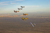 SGR100106M
Extra 300 aerobatic aircraft fly in formation over Mesa, Arizona.