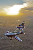 SGR100107M
Extra 300 aerobatic aircraft fly in formation over Mesa, Arizona.