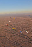 SGR100111M
Extra 300 aerobatic aircraft fly in formation over Mesa, Arizona.