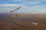 SGR100139M
Extra 300 aerobatic aircraft fly in formation over Mesa, Arizona.