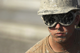 STK0003MX
A U.S. Navy Seabees pours cement during the construction of an aircraft staging area.