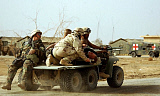 STK0022MX
Members transport a patient to a hospital.
