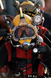 STK0041MX
U.S. Navy Officer wears the MK-21 Mod One diving helmet.