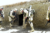 STK0066MX
Soldiers ready to enter and clear a room of all threats and cached weapons.