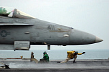 STK100202M
A catapult shooter gives the signal to launch an F/A-18C Hornet.