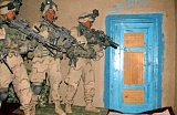STK100223M
U.S. Army Soldiers armed with 5.56mm M4 carbines and a 5.56mm M249 Squad Automatic Weapon.
