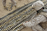 STK100255M
Soldiers arrange all the ordnance confiscated from caches into one big pile to be exploded.