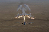 STK100919M
Aerial shot over Iraq of a KC-130 Stratotanker firing flares.