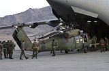 STK101078M
Airmen load an HH-60 Pave Hawk helicopter aboard a C-17 Globemaster III.
