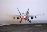 STK101255M
An F/A-18C Hornet launches from the flight deck aboard USS Theodore Roosevelt.