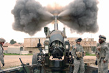 STK101612M
U.S. Army Soldiers conduct a calibration fire of a M198 Howitzer.