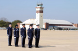 STK101655M
U.S. Air Force Honor Guards stand in place on the flight line.