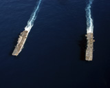 STK101663M
USS Iwo Jima steams alongside USS Kearsarge during a weapons off-load.