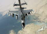 STK101673M
An F-16 Fighting Falcon refuels from a KC-10 Extender.
