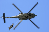 STK101675M
Members conduct a helicopter rope suspension techniques exercise from a SH-60F Seahawk.