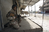 STK101822M
An Iraqi solider holds security.