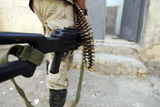 STK101823M
Iraqi soldiers carrying machine guns and rifles.