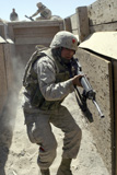 STK101918M
A marine establishes a foothold in a trench during a live-fire exercise.