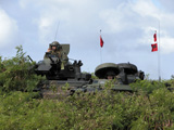 STK101997M
Marines provide security in their assault amphibious vehicle.