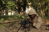 STK102143M
SAW gunner sights in on a potential target.