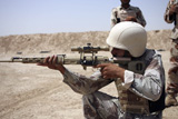 STK102160M
Iraqi Army Sergeant sights in down range during an advanced marksmanship course.