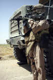STK102162M
A soldier provides security for Marines.