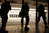 STK102174M
Airmen tests their skills at the shooting range.