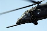 STK102177M
An aerial gunner waves goodbye from an HH-60G Pave Hawk.