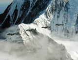 STK102356M
A-10 Thunderbolt II's fly over mountainous landscape.