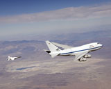 STK102622M
The SOFIA infrared observatory and F/A-18 safety chase during a test flight.