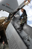 STK102669M
Airman assists in loading a HH-60G Pave Hawk onto a C-5 Galaxy.