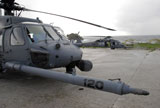 STK102877M
Two HH-60G Pave Hawks sit at a helipad at Farallon Island.