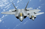 STK102904M
Two F-22 Raptors fly over the Pacific Ocean.