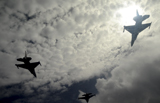 STK102960M
Three F-16 Fighting Falcons fly in formation over Guam.