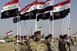 STK103092M
Iraqi Army soldiers standing in formation during a certification ceremony.