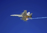 STK103108M
An F/A-18C Hornet testing its flare countermeasures system prior to heading into Iraq.