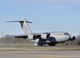 STK103271M
A C-17 Globemaster III doing an assault landing on a new runway at Allen Army Airfield, Alaska.