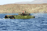 STK103522M
Amphibious assault vehicle crewmen conduct a water gunnery range at a Djibouti beach.