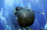 STK103536M
A SEAL Delivery Vehicle Team member launching a SEAL Delivery Vehicle from the back of USS Philadelphia.