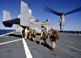 STK103604M
Marines board an MV-22 Osprey aboard the USS New York.
