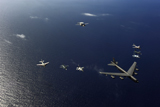 STK103729M
A U.S. Air Force B-52 Stratofortress aircraft leads a formation of aircraft.