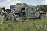 STK103755M
Soldiers recover the victim of a simulated roadside bomb