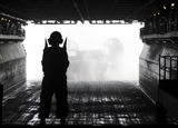 STK103776M
Boatswain's Mate directs a landing craft air cushion as it approaches USS Kearsarge.