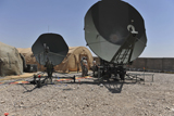 STK103831M
U.S. Air Force members work on a communication satellite dish.