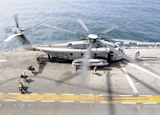 STK103898M
U.S. Marines board an MH-53E Sea Dragon helicopter aboard the USS Peleliu.