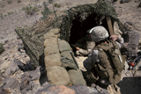 STK103930M
Marines provide security over the Combat Logistics Support Area.
