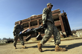 STK104193M
U.S Army Soldiers transport a manikin during a simulated attack.