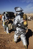 STK104292M
Firefighters move a casualty to a triage area at Camp Dwyer, Afghanistan.