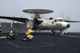 STK104471M
A shooter gives the signal to launch an E-2C Hawkeye.